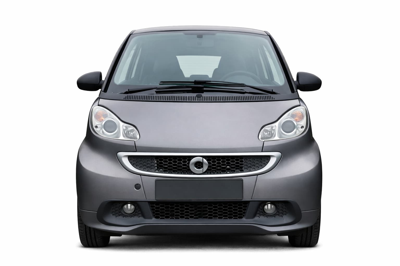 Silberner Smart fortwo Cabrio, Baujahr 2014 – kleines, wendiges Auto mit Cabrio-Dach, ideal für junge Stadtfahrer.